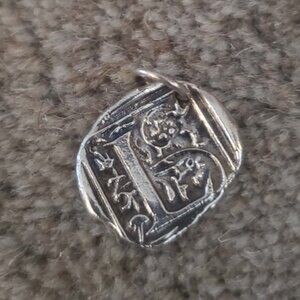 Waxing Poetic L charm, sterling silver, still in pouch